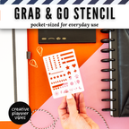 Hand holding the Grab & Go pocket-sized planner stencil over a disc-bound planner